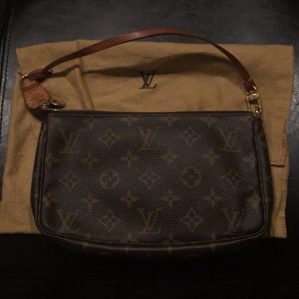 LV Authentic Pochlette/Wristlet.